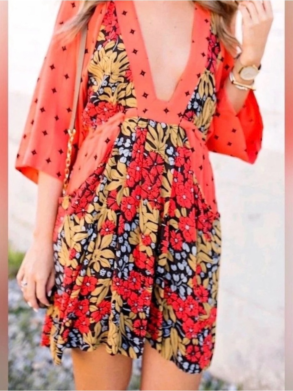 Free People Talulla Printed Mini Dress featuring a deep V-neck and relaxed bish